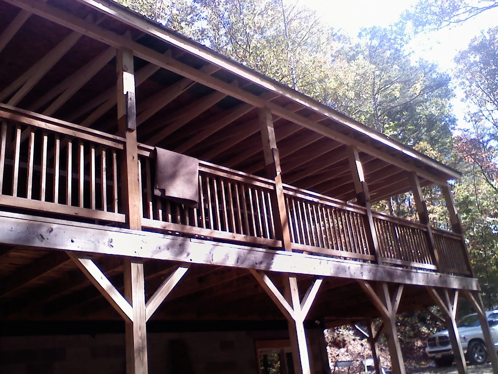 Timber framing under a new elevated porch and deck — Roof Leak Repair in Lyme by Roofing Brothers